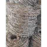 Double stranded barbed rope