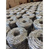 Double stranded barbed rope